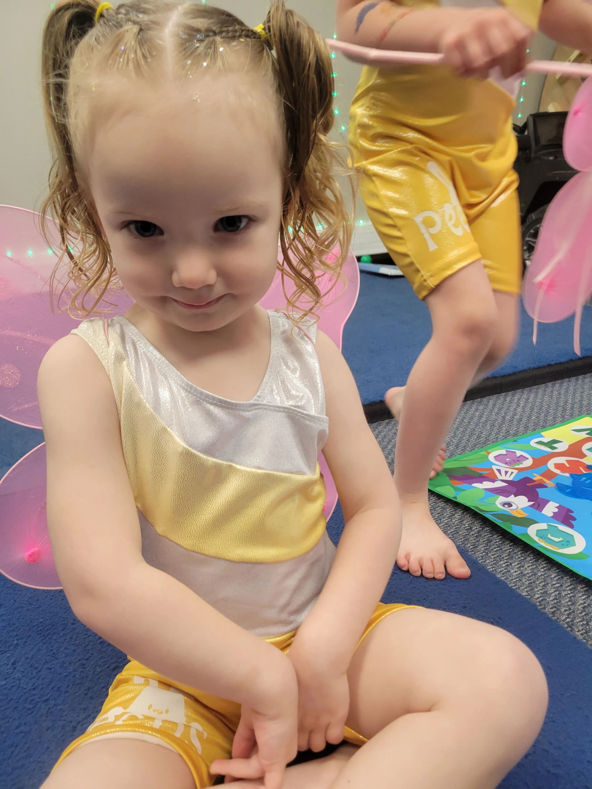 A young Allison's Dance Company student dressed for class
